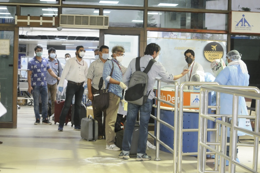 Patna: Indian nationals stranded abroad arrive at Jay Prakash Narayan International Airport after returning to Patna via one of the special flights being operated by Air India under the Vande Bharat Mission launched by the Central Government to bring back stranded Indians home, during the extended nationwide lockdown imposed to mitigate the spread of coronavirus, on May 15, 2020. (Photo: IANS) by . 