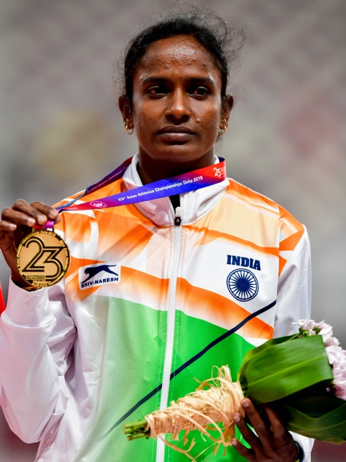 Doha, April 23, 2019 (Xinhua) -- Gold medalist Gomathi Marimuthu of India poses for photos during the awarding ceremony of the women's 800m event at 23rd Asian Athletics Championships at Khalifa International Stadium in Doha, capital of Qatar, April 22, 2019. (Xinhua/Nikku/IANS) by . 