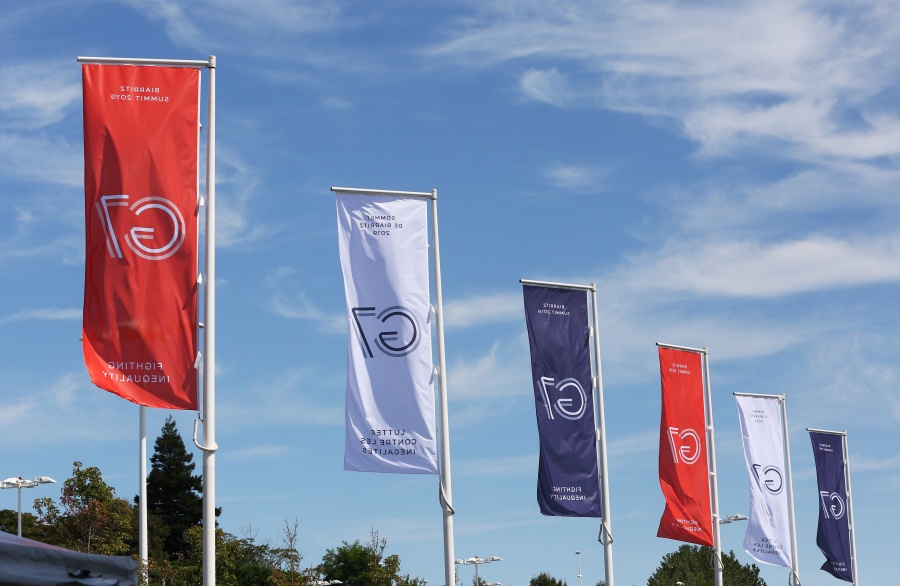 BIARRITZ, Aug. 24, 2019 (Xinhua) -- Flags with the G7 logo are seen outside the press center in Biarritz, southwestern France, Aug. 23, 2019. The summit of the G7 heads of state will be held on Aug. 24 to 26 in Biarritz on Saturday. (Xinhua/Gao Jing/IANS) by . 