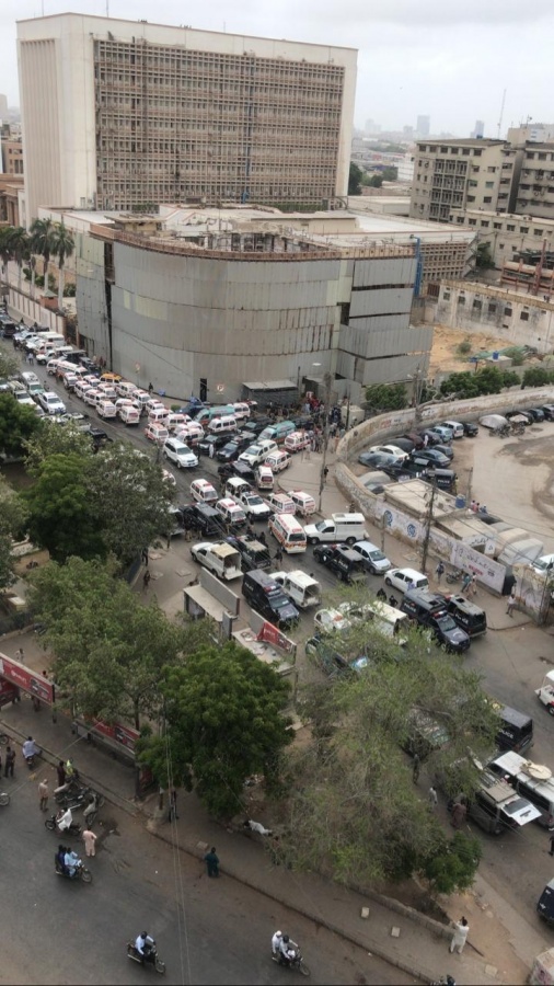 Pakistani stock exchange attacked by Gunmen. by .