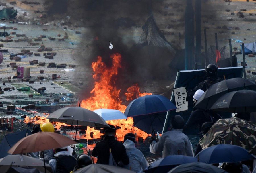HONG KONG, Nov. 19, 2019 (Xinhua) -- Rioters set fire and confront police outside the Hong Kong Polytechnic University in south China's Hong Kong, Nov. 17, 2019. Several former world leaders voiced their firm support for the Chinese central government's stance on the situation of the Hong Kong Special Administrative Region (HKSAR), saying they believed that China has the political wisdom to resolve social disturbance, end violence and restore order in Hong Kong. (Xinhua/IANS) by .