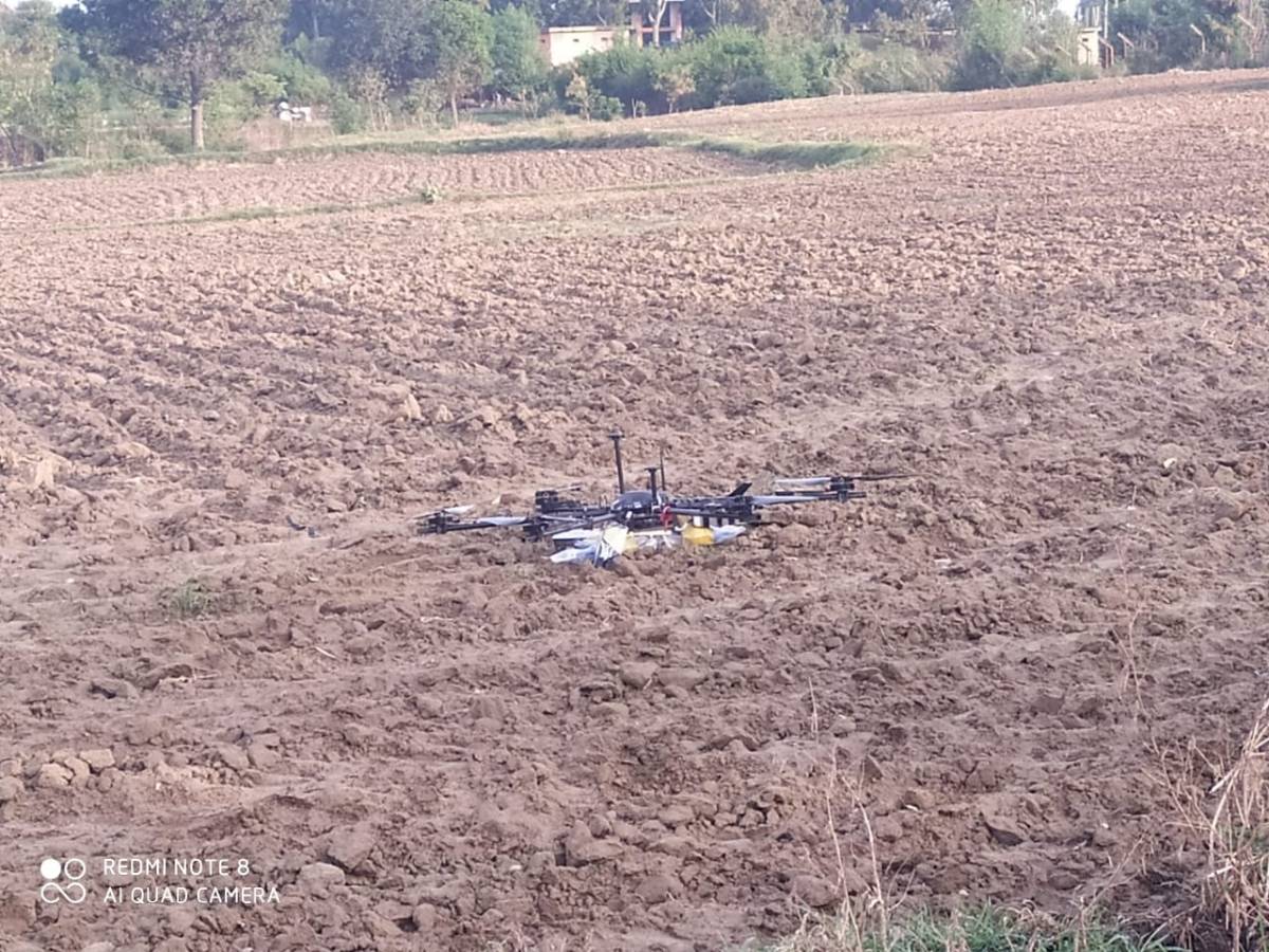 BSF shoots down Pak drone carrying weapons in J&K's Kathua. by . 
