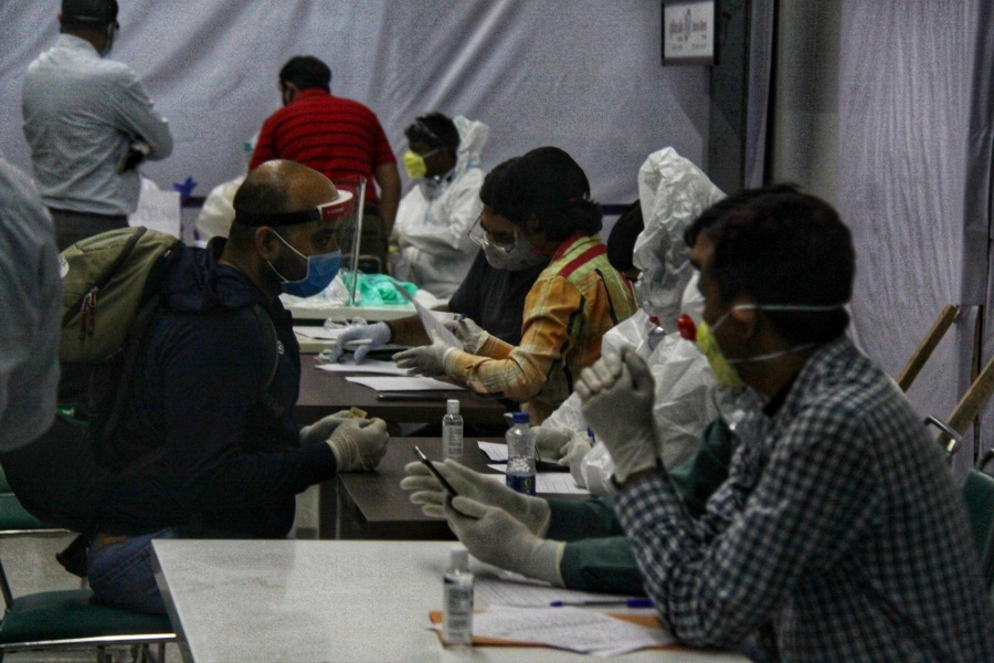 New Delhi: Indian nationals stranded abroad arrive from Singapore being screened for COVID-19 as they halt at Indira Gandhi International Airport in New Delhi on May 8, 2020. (Photo: IANS) by . 