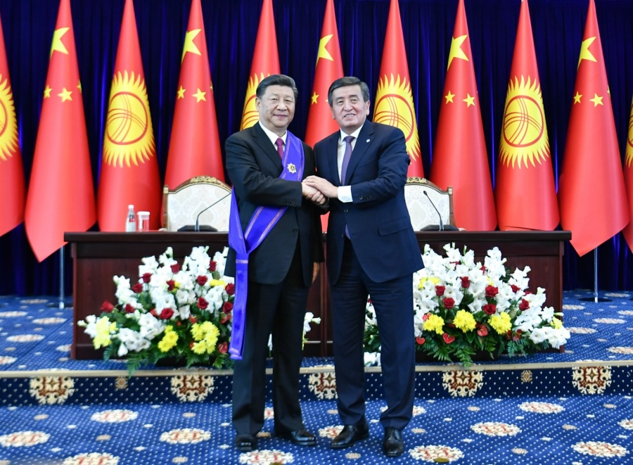 BISHKEK, June 13, 2019 (Xinhua) -- Chinese President Xi Jinping is awarded the Manas Order of the First Degree, the highest national prize of Kyrgyzstan, by his Kyrgyz counterpart Sooronbay Jeenbekov in Bishkek, Kyrgyzstan, June 13, 2019. (Xinhua/Yin Bogu/IANS) by . 