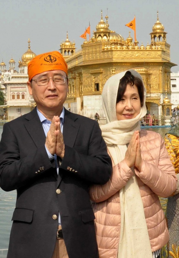 Amritsar: South Korean Ambassador to India Shin Bong-kil along with his wife pays obeisance at the Golden Temple in Amritsar, on Feb 29, 2020. (Photo: IANS) by . 