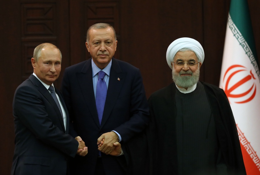 ANKARA, Sept. 16, 2019 (Xinhua) -- Turkish President Recep Tayyip Erdogan (C), Russian President Vladimir Putin (L) and Iranian President Hassan Rouhani pose for a group photo after their summit in Ankara, Turkey, on Sept. 16, 2019. Turkey, Russia and Iran focused on the security issue in Syria on Monday in Ankara during a three-way talk and emphasized the need of a long-lasting truce in the northwestern Idlib region of the war-torn country. (Photo by Mustafa Kaya/Xinhua/IANS) by .