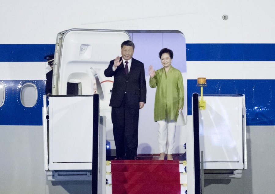 BRASILIA, Nov. 12, 2019 (Xinhua) -- Chinese President Xi Jinping and his wife Peng Liyuan walk out of the plane upon their arrival in Brasilia, Brazil, Nov. 12, 2019. Chinese President Xi Jinping arrived here Tuesday night for the upcoming 11th BRICS summit. (Xinhua/Ding Haitao/IANS) by .