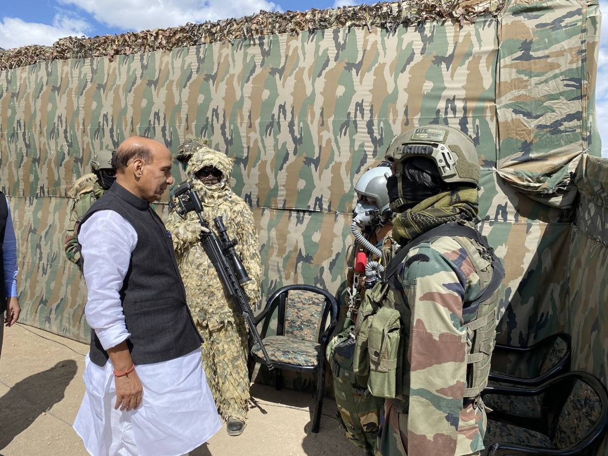 Leh: Defence Minister Rajnath Singh with the troops who participated in the para dropping and other military exercises at Stankna near Leh on July 17, 2020. Also seen Chief of Defence Staff General Bipin Rawat and Army Chief General Manoj Mukund Naravane. (Photo: IANS) by . 