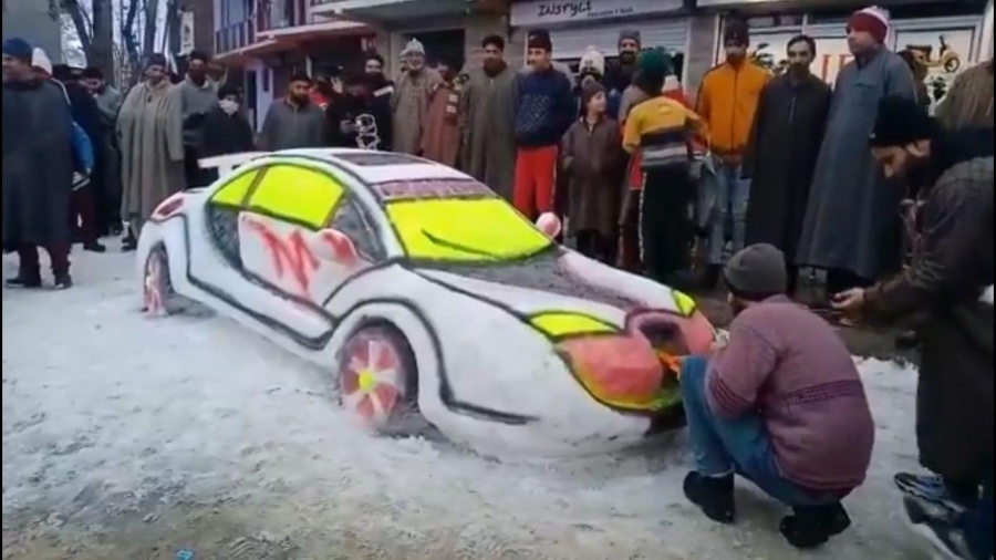 Video of a Kashmiri Youth, named Zubair Ahmed from Budgam district is making rounds of the Internet, who made a supercool 'snow car.' It took him two days to finish it. The car is so beautiful that the citizens were captured taking pictures and selfies, posing with the snow car. by . 