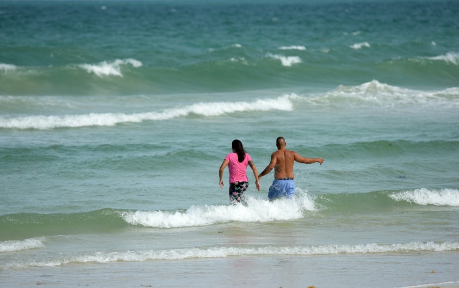 MIAMI, Sept. 9, 2017 (Xinhua) -- People play at a beach as hurricane Irma approaches in Miami of Florida, the United States, Sept. 8, 2017. The U.S. National Hurricane Center said Friday evening that hurricane Irma has strengthened to category five. (Xinhua/Yin Bogu/IANS) by . 