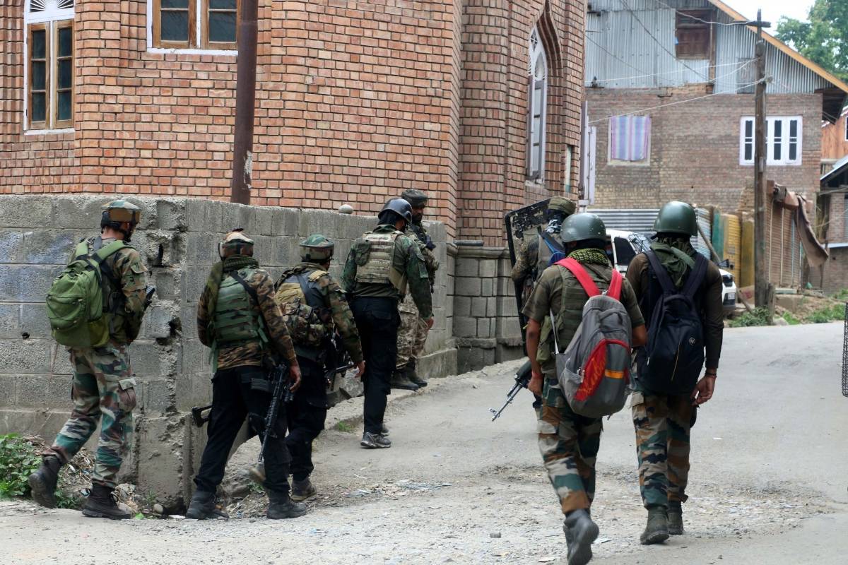 Kulgam: Security personnel carry out cordon and search operations after one terrorist was killed in an encounter at South Kashmir's Kulgam district on July 4, 2020. The encounter started after security forces got an input about the presence of terrorists in Arrah area of Kulgam. (hoto: IANS) by .