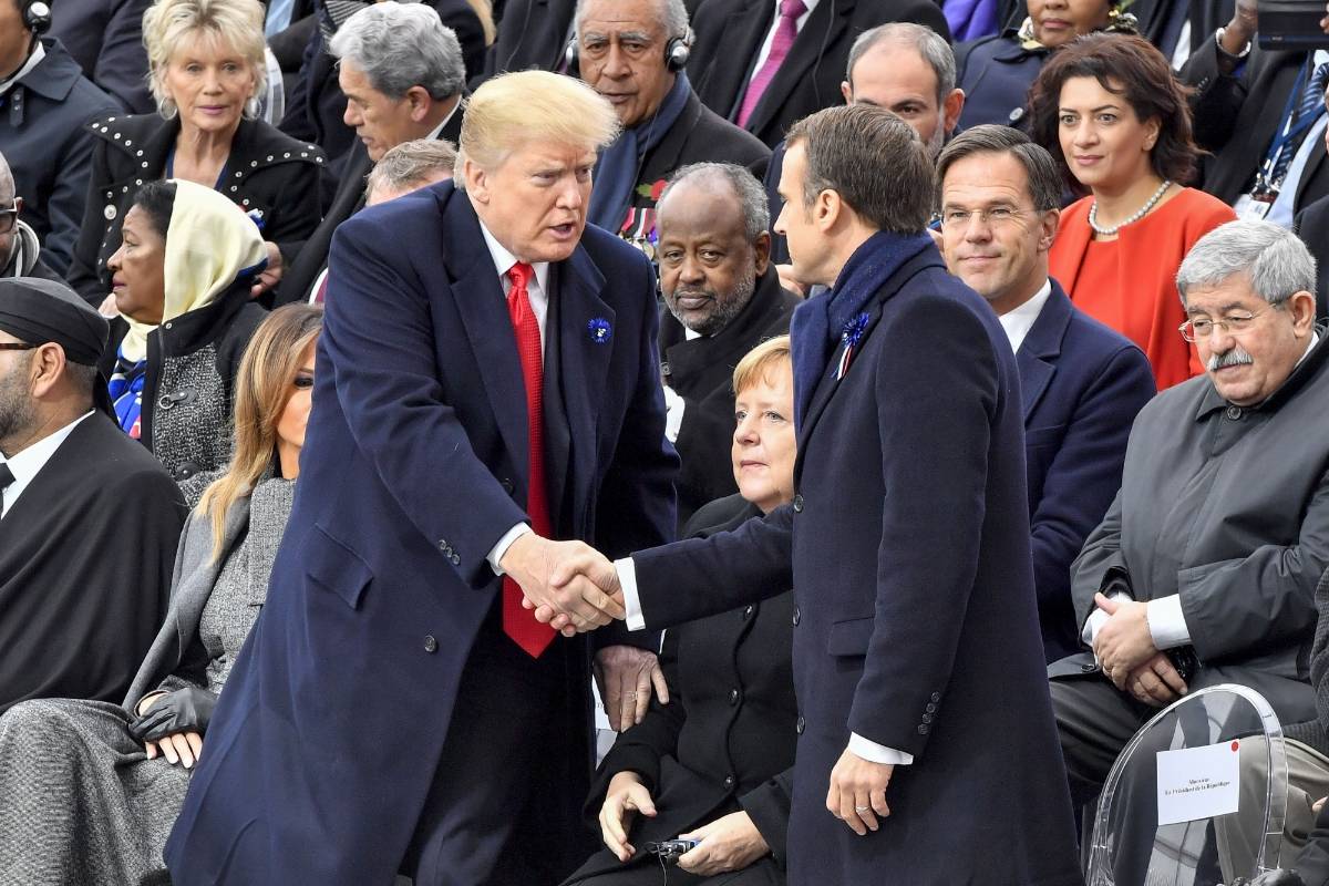 PARIS, Nov. 11, 2018 (Xinhua) -- French President Emmanuel Macron (R, Front) shakes hands with U.S. President Donald Trump during a ceremony to mark the centenary of the Armistice of the First World War in Paris, France, Nov. 11, 2018. (Xinhua/Chen Yichen/IANS) by . 