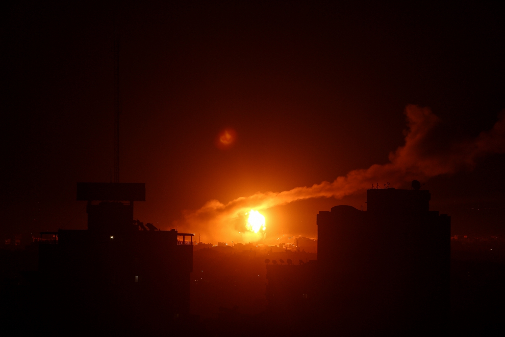 GAZA, Jan. 15, 2020 (Xinhua) -- Photo taken on Jan. 15, 2020 shows a fireball exploding during Israeli air strikes in Gaza City. Israeli warplanes carried out on Wednesday night air strikes against military positions in the Gaza Strip in response to earlier firing of rockets from the Hamas-ruled enclave into southern Israel, eyewitnesses and security sources said. (Photo by Mohammed Dahman/Xinhua/IANS) by . 
