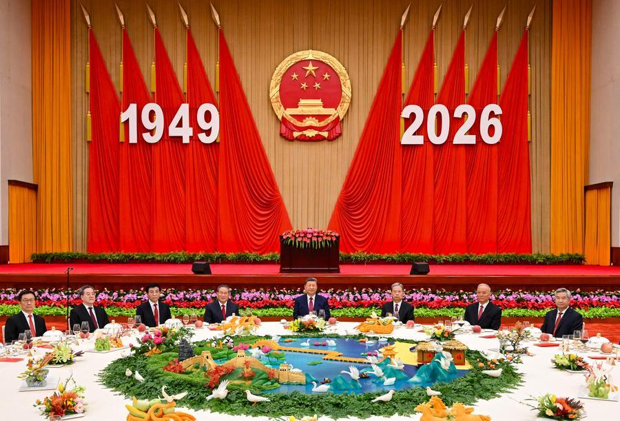 The Communist Party of China and state leaders Xi Jinping, Li Qiang, Zhao Leji, Wang Huning, Cai Qi, Ding Xuexiang, Li Xi and Han Zheng attend a reception to celebrate the 77th anniversary of the founding of the People's Republic of China along with around 800 guests at the Great Hall of the People in Beijing, capital of China