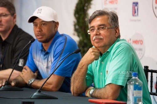  Vice-Chairman and Managing Director of Hero MotoCorp Ltd. Pawan Munjal with company first Global Corporate Partner, Tiger Woods in Orlando, Florida, United States on Dec 2, 2014. 