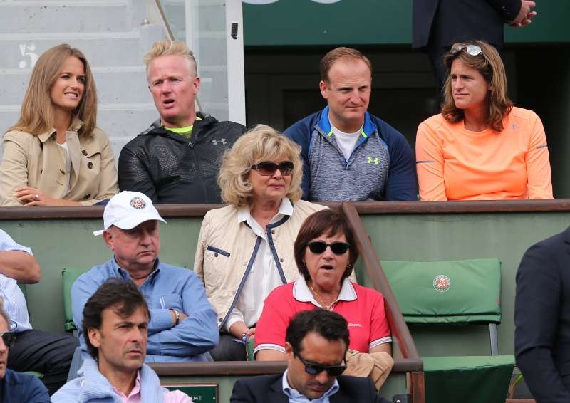 Andy Murray's wife Kim Murray (1st L, above row) and his coach Amelie Mauresmo (1st R, above row) are seen during the men's singles second round match between Andy Murray of Britain and Joao Sousa of Portugal at 2015 French Open tennis tournament at Roland Garros, in Paris, France on May 28, 2015.