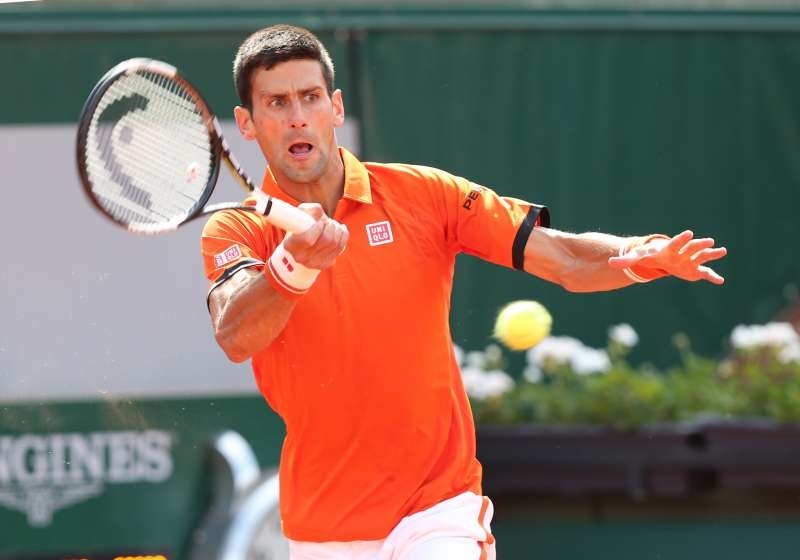 Novak Djokovic of Serbia hits a return during the men's singles second round match against Gilles Muller of Luxembourg at 2015 French Open tennis tournament at Roland Garros, in Paris, France on May 28, 2015.