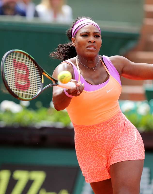 Serena Williams of the United States hits a return during the women's singles second round match against Anna-Lena Friedsam of Germany at 2015 French Open tennis tournament at Roland Garros, in Paris, France on May 28, 2015.