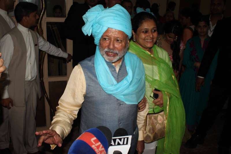 Shahid's parents arrive for the ceremony