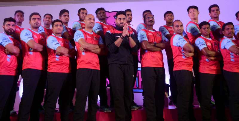 Actor and owner of Pro Kabaddi team `Pink Panther` Abhishek Bachchan with his team during a press conference in Mumbai