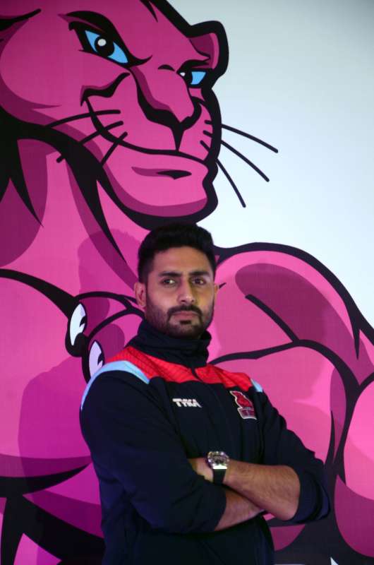 Actor and owner of Pro Kabaddi team `Pink Panther` Abhishek Bachchan with his team during a press conference in Mumbai