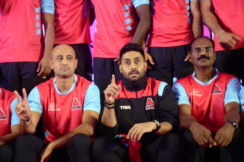 Actor and owner of Pro Kabaddi team `Pink Panther` Abhishek Bachchan with his team during a press conference in Mumbai