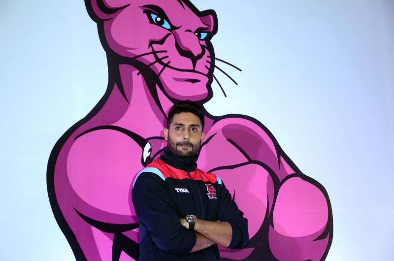 Actor and owner of Pro Kabaddi team `Pink Panther` Abhishek Bachchan with his team during a press conference in Mumbai