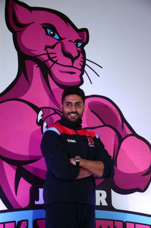 Actor and owner of Pro Kabaddi team `Pink Panther` Abhishek Bachchan with his team during a press conference in Mumbai