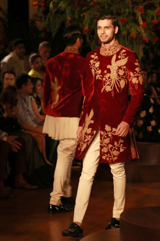 Models walk on the ramp with designer Rohit Bal during the Amazon India Couture Week 2015, in New Delhi.