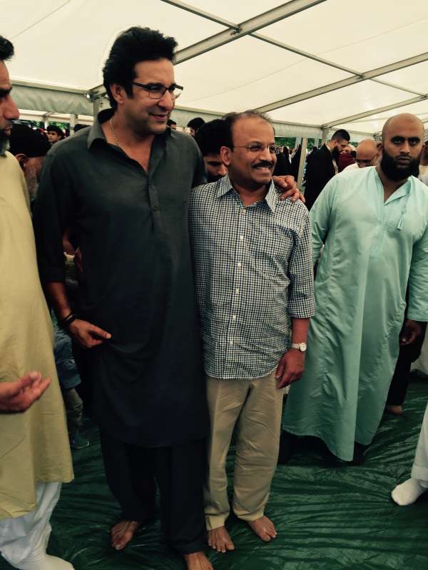 Former Pakistan cricketer Wasim Akram with Dr Ijazs Moideen during the Eid prayers at Altrincham, Manchester