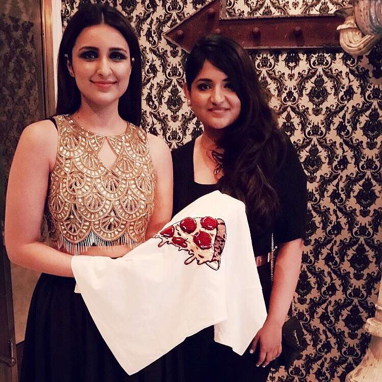 Punarvi Patel presenting a tee to Bollywood actress Parineeti Chopra (left) when Parineeti was in New York to star as Guest of Honour at the India Day Parade on Aug 16.