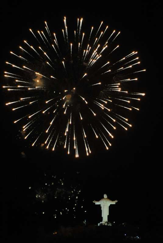 Fireworks explode over the statue of Cristo de la Concordia in Cochabamba, Bolivia