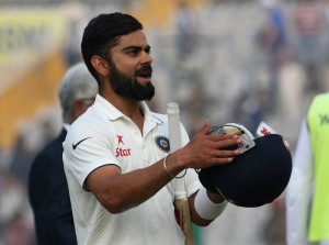 Mohali: India's Test cricket captain Virat Kohli celebrates after winning the third test match against England at Punjab Cricket Association IS Bindra Stadium, Mohali on Nov 29, 2016. (Photo: Surjeet Yadav/IANS)