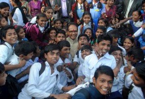 Bhopal: Madhya Pradesh Chief Minister Shivraj Singh Chouhan meets school students to celebrate his 11th year tenure in the state in Bhopal on Nov 29, 2016. (Photo: IANS)