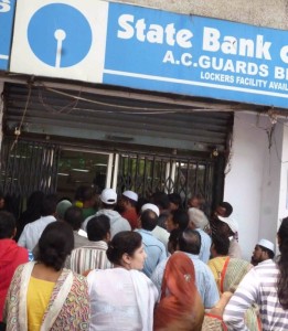 Hyderabad: People queue up in front of an ATM kiosks in Hyderabad on Nov. 11, 2016. ATMs were reopened after two days and started disbursing new series of Rs 500 and Rs 2,000 currency notes. (Photo: IANS)