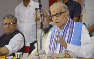 Senior BJP leader Murli Manohar Joshi addresses during a BJP programme in Patna on April 11, 2015. Also seen BJP leader Sushil Kumar Modi (Photo: IANS)