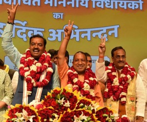 BJP's Uttar Pradesh Chief Minister designate Yogi Adityanath (C) with Deputy Chief Ministers designate Keshav Prasad Maurya (L) and Dinesh Sharma (R) during a press conference in Lucknow (Photo: IANS)