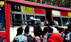 New Delhi: Migrant workers seen leaving for their homes at Delhi's Anand Vihar Bus Terminal on Day 4 of the lockdown imposed in the wake of the coronavirus pandemic, on March 28, 2020. (Photo: IANS)