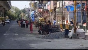 Covid-19: Women, children wait for ration, food on Noida streets.