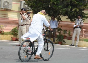 Patna: BJP legislator Sanjay Paswan arrives at the Bihar Assembly on a bicycle on the first day of the monsoon session, in Patna on June 28, 2019. (Photo: IANS)