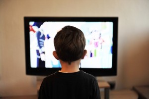 Children watching Television.