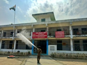 Longding: A firefighter sprays disinfectant at Longding in Arunachal Pradesh during the 21-day nationwide lockdown imposed as a precautionary measure to contain the spread of COVID-19 (coronavirus), on Apr 1, 2020. (Photo: IANS)